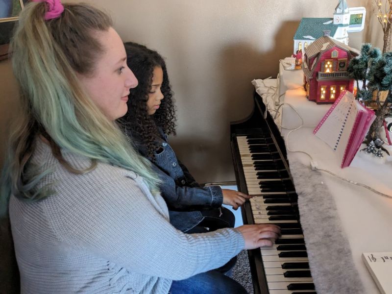 Samantha Playing Piano With Her Second Cousin