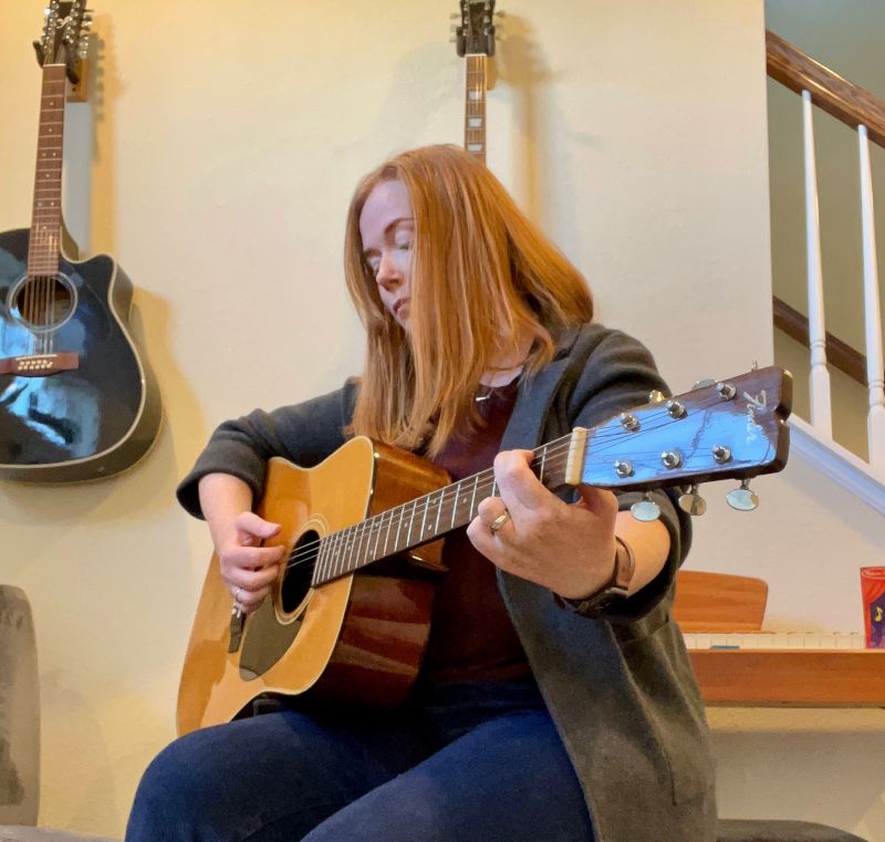 Wendy Playing Guitar